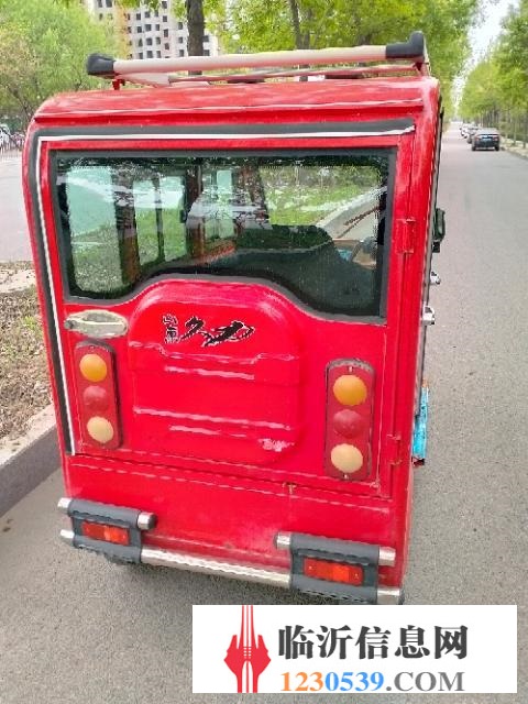 電動三輪車。